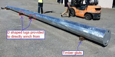 Pole sections loosely assembled with forklift ready for joint assembly.